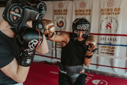 RIVAL Boxing RHG10 Intelli-Shock Headgear, D3O Front and Side Padding, Hook and Loop Back Adjustment with Lace on Top, and Anatomical Rear Head Pad Every Time - color: Black/Gold, size: Medium